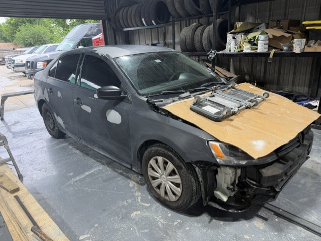 Color-matched basecoat on collision-repaired panel Houston TX