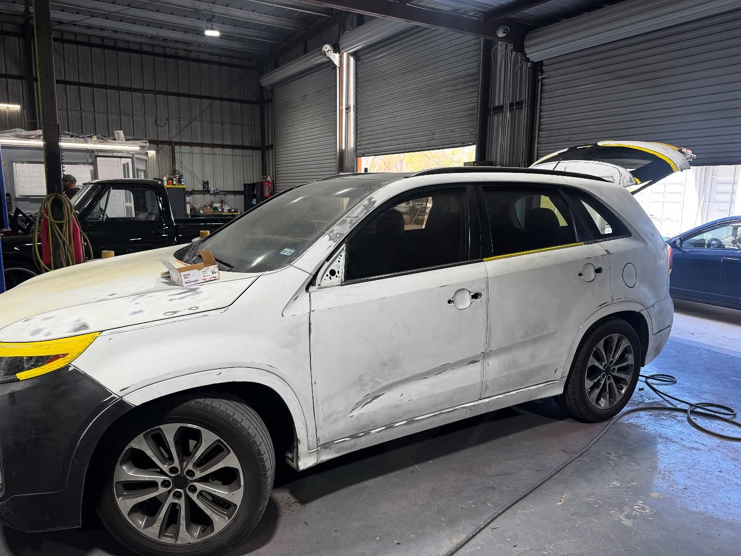 Black Kia full paint restoration Houston TX — project photo 13 of 13