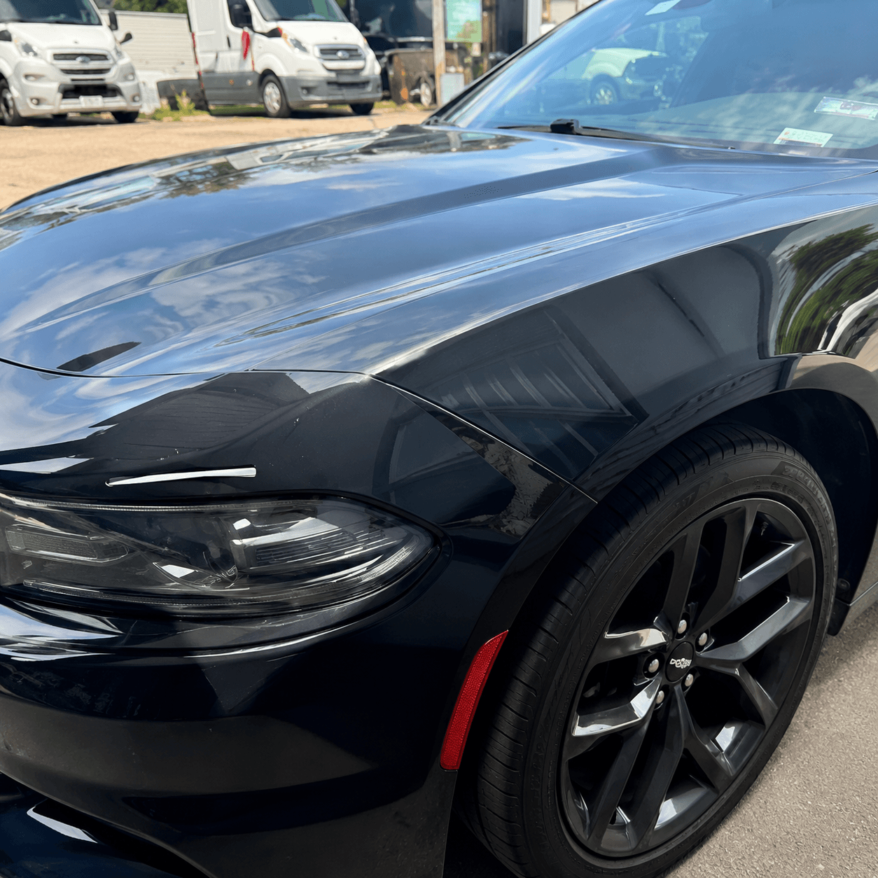 Dodge Charger after collision repair and paint restoration at Fresh Paint Auto